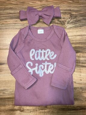 #7. Amazon - 'Little Sister' Mauve Ribbed Baby Romper with Bow